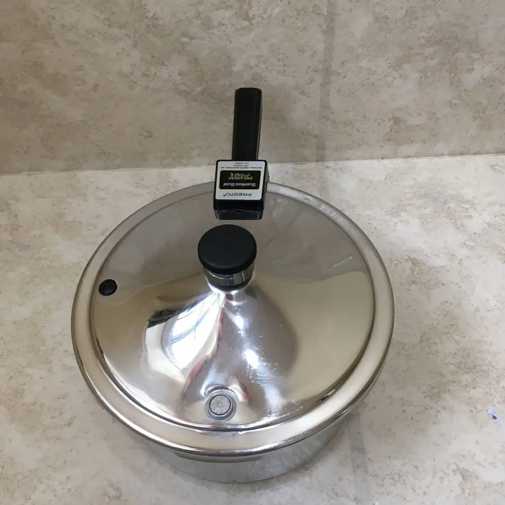 PRESTO‎ STAINLESS STEEL 4 QUART PRESSURE COOKER